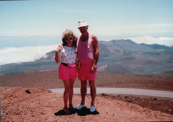 Mario R. Alvarez, Sr. on a mountaintop above the clouds